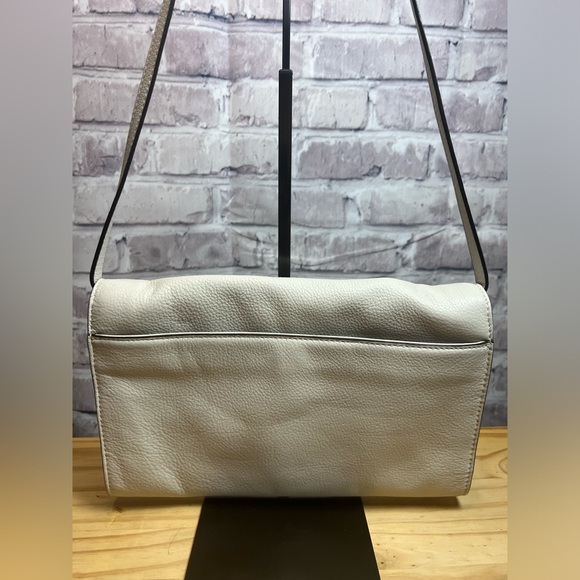 Michael Kors Pebbled Leather Clutch with Removable Strap - Picture 7 of 16